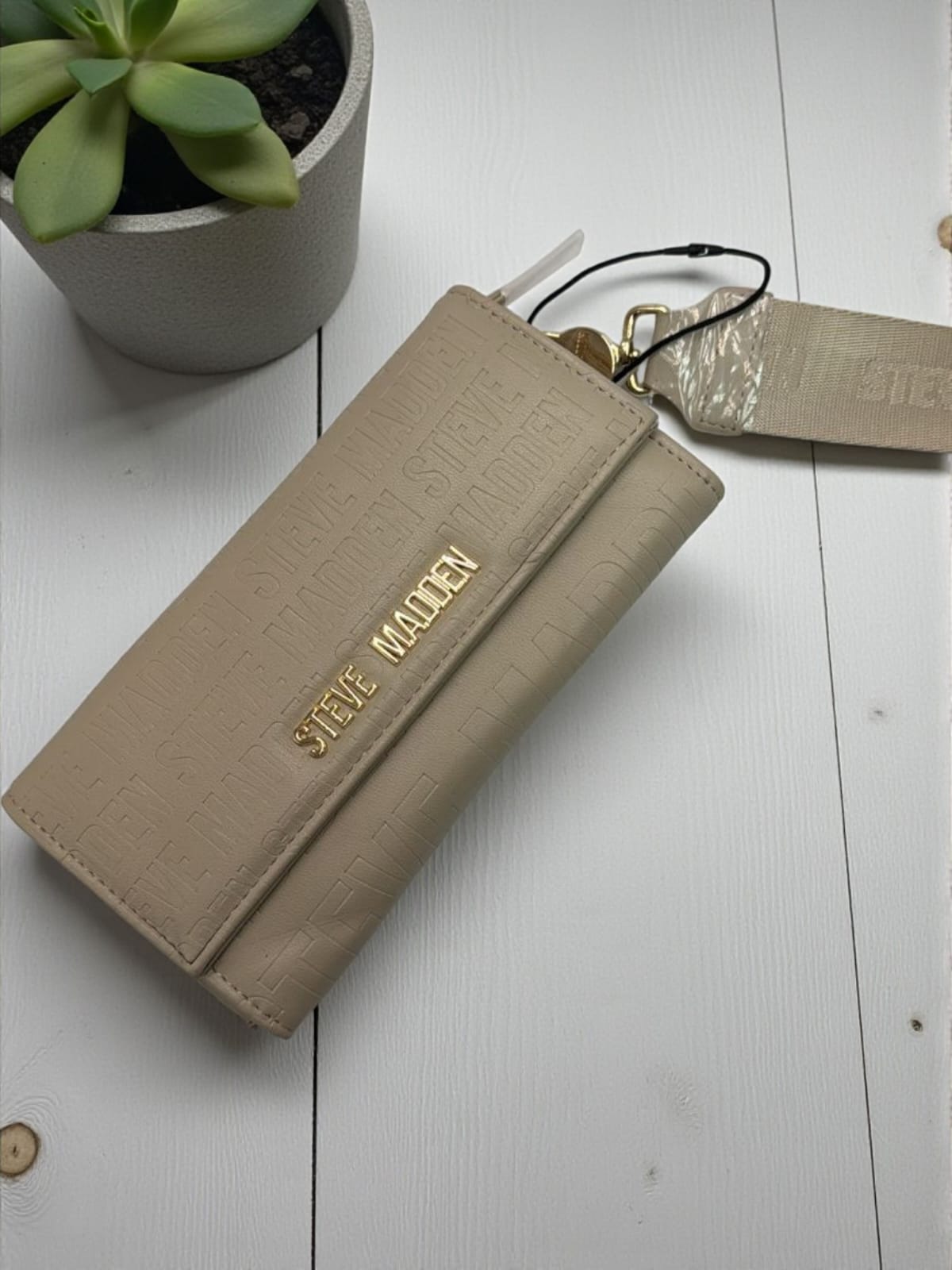 CARTERA STEVE MADDEN HOLOGRAM